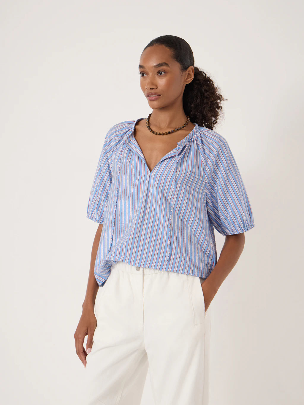 Red and light blue balloon sleeve blouse.
