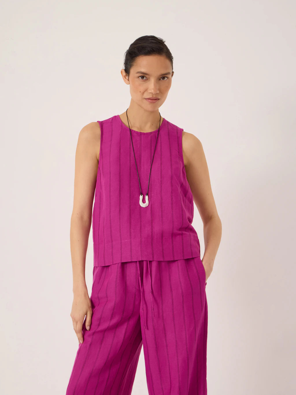 Linen blend swing top in magenta pink.