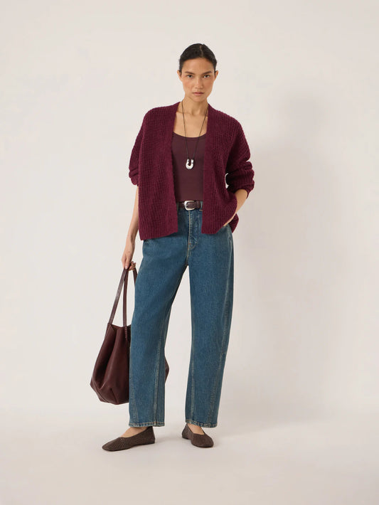 Faded blue tapered leg jeans.