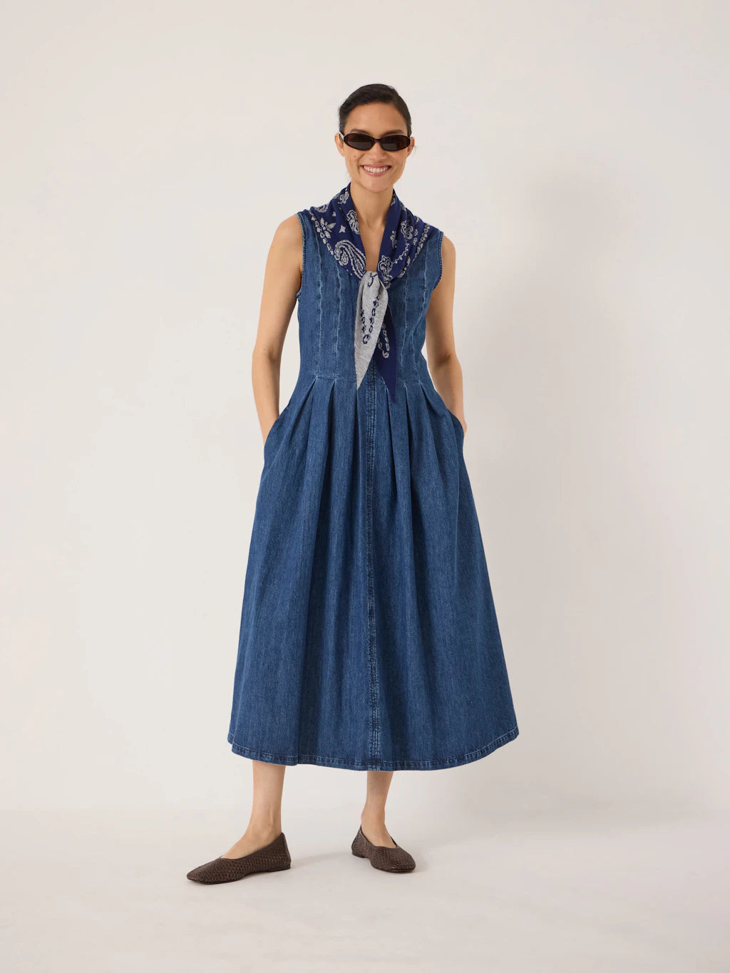 Pleated denim midi dress.