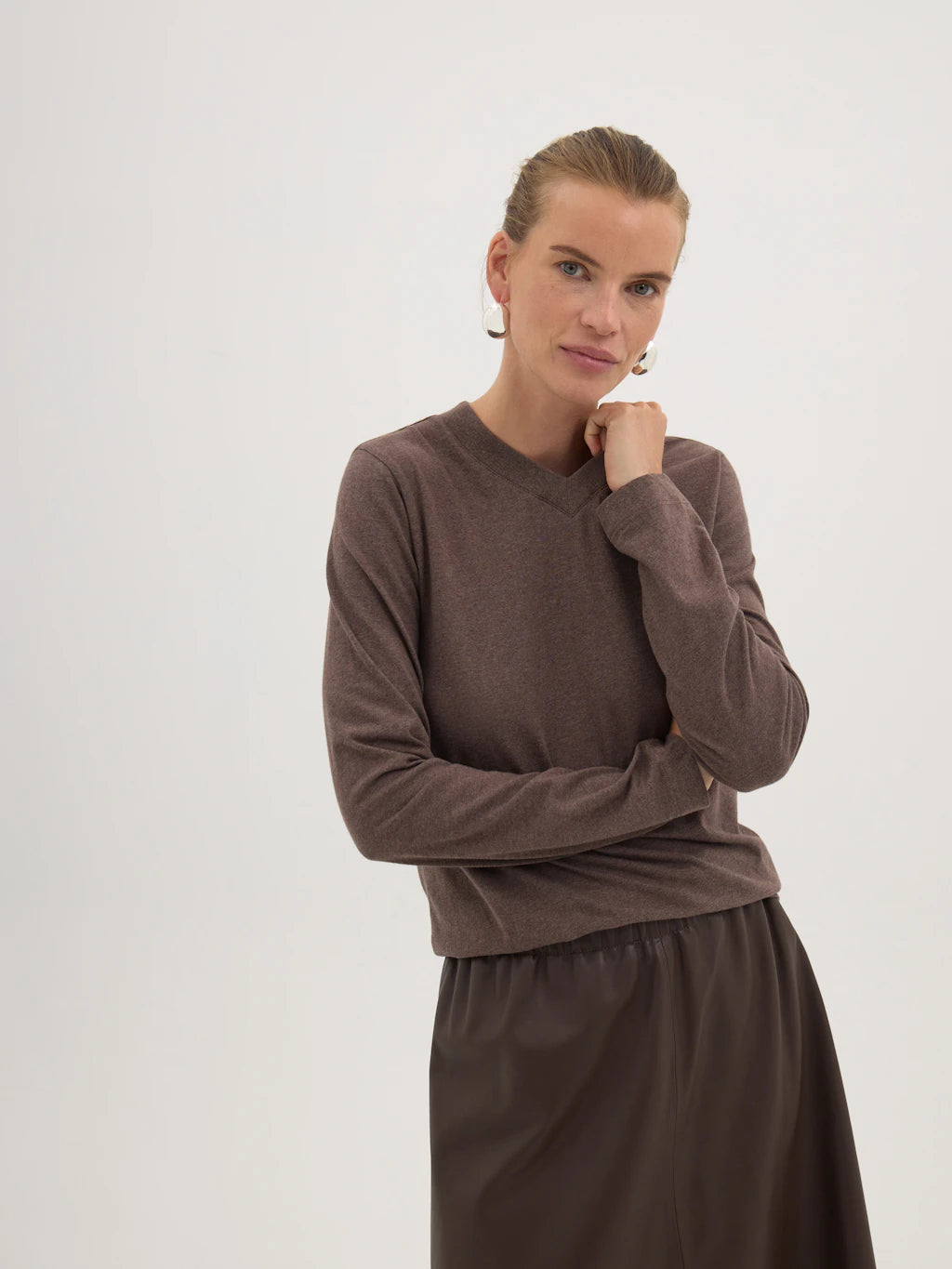 Soft brown v-neck top.