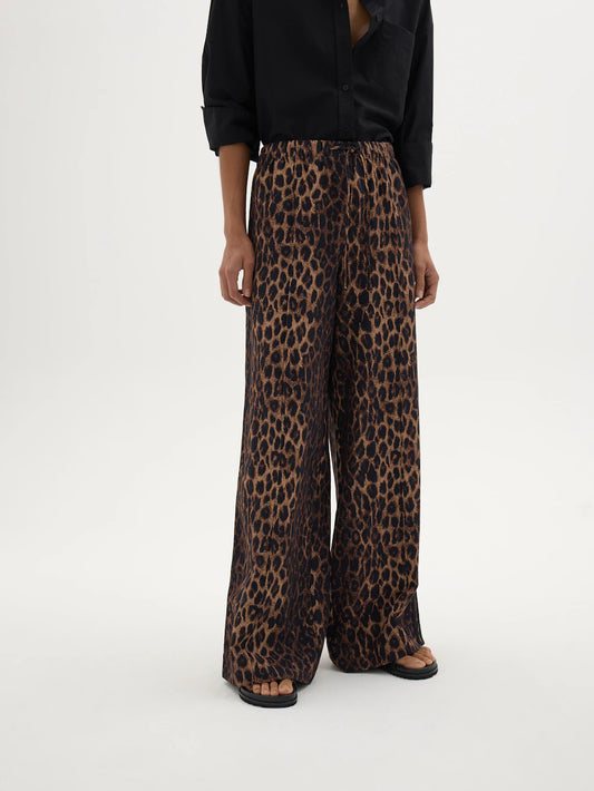 Brown leopard print wide leg linen blend trousers.