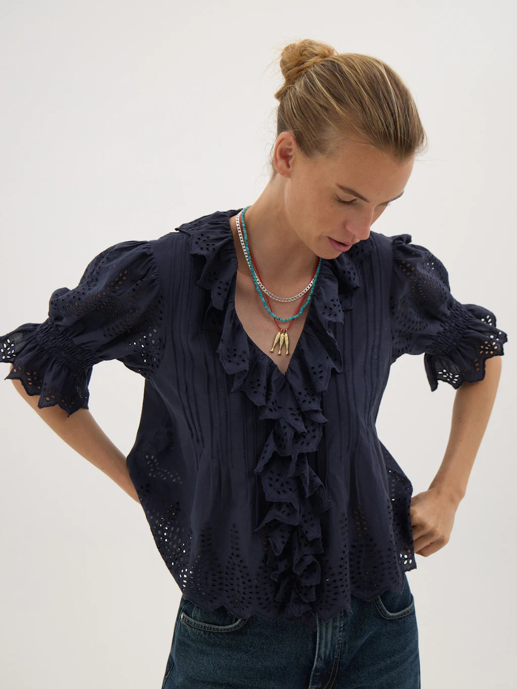 Navy broderie blouse.