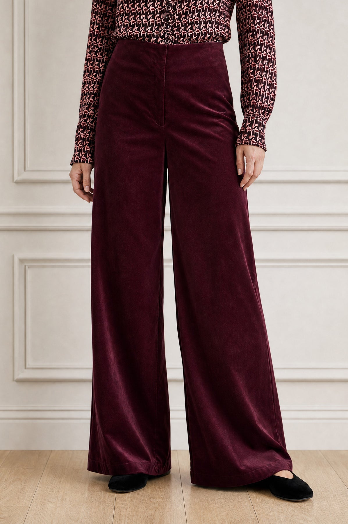 Wide leg velvet burgundy trousers.
