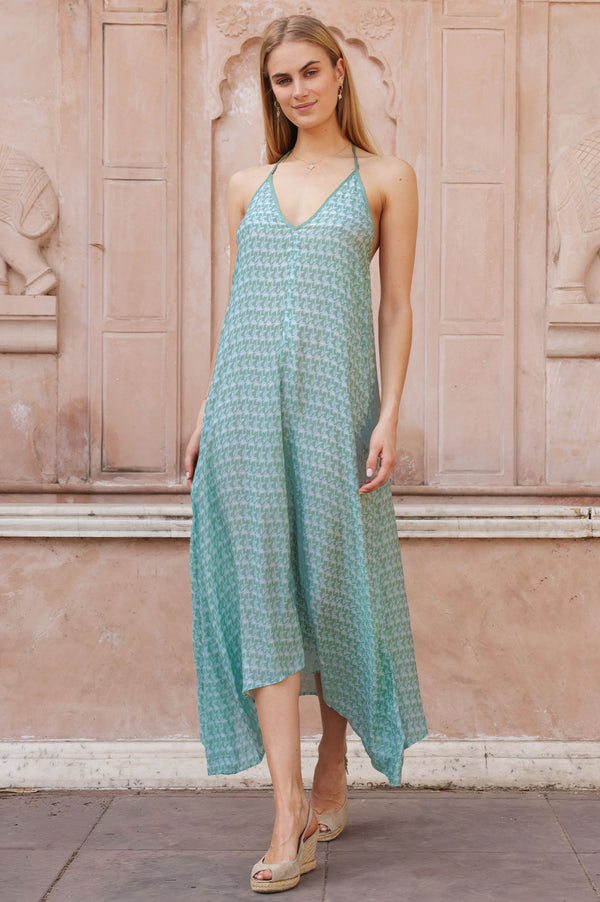 Sage green geometric print halterneck dress.