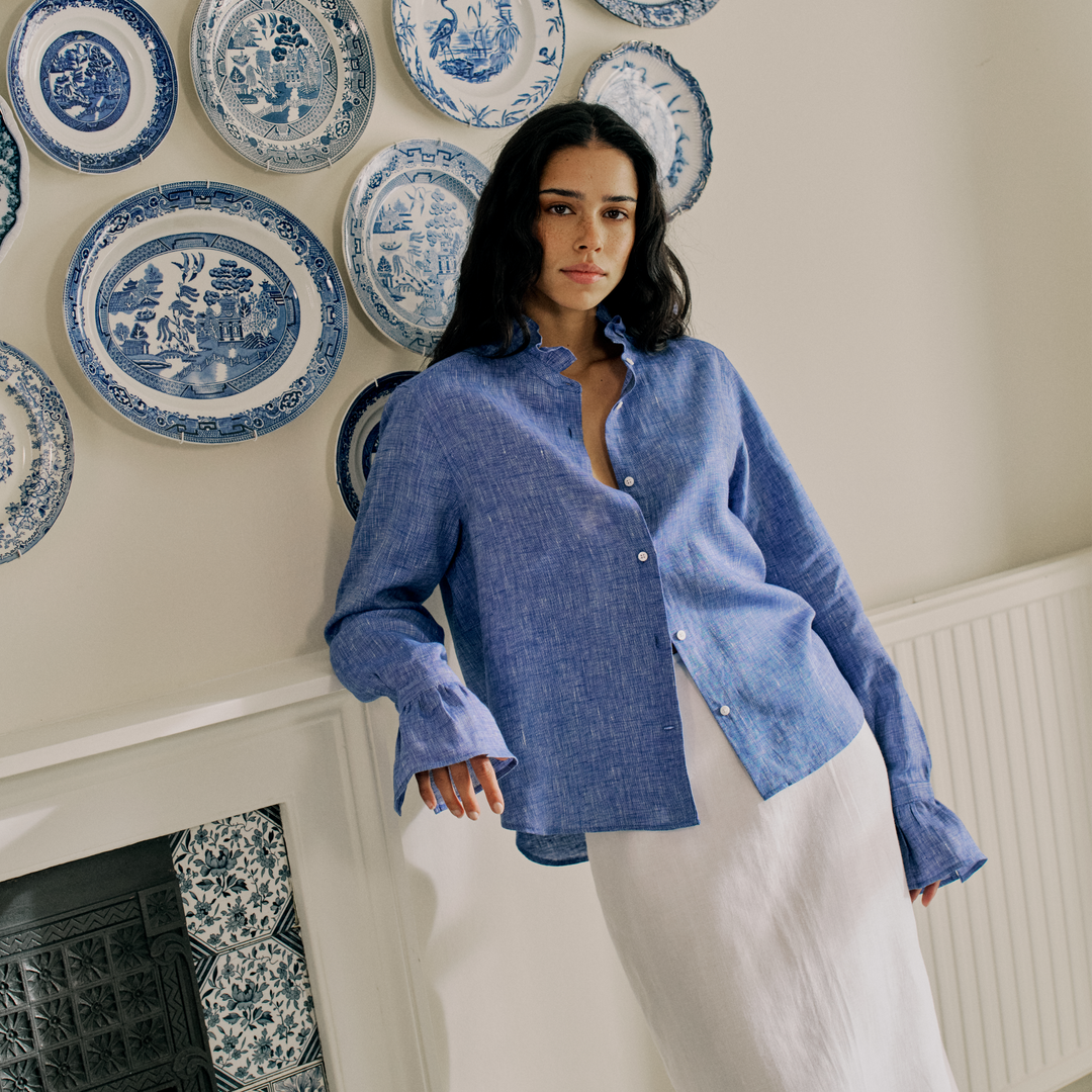 Pie crust collar shirt in blue linen.