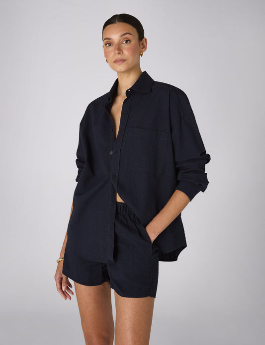 Navy blue seersucker shorts.