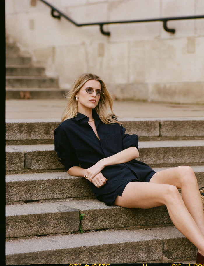 Navy blue organic cotton seersucker shirt.