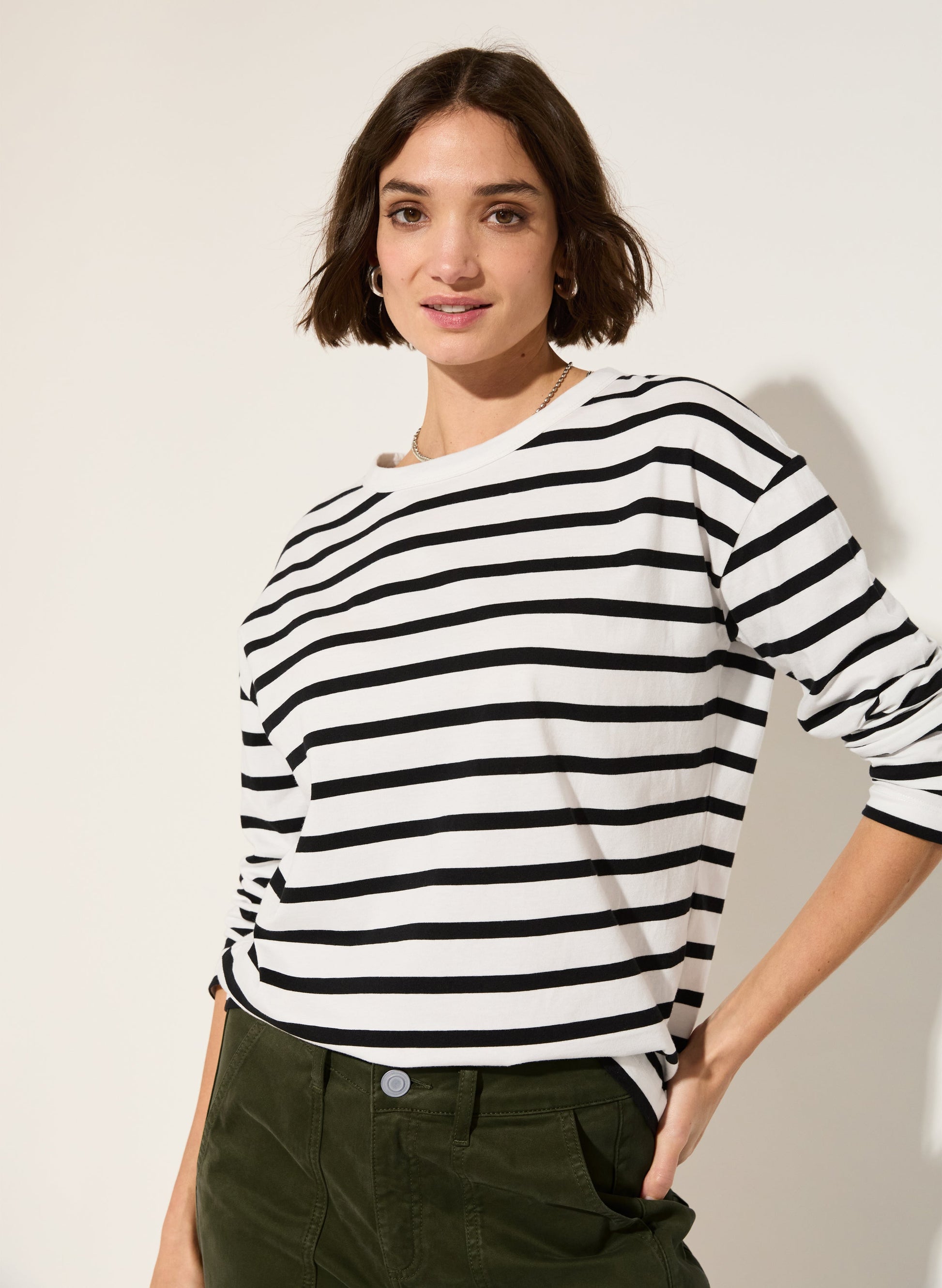 Black and white striped long-sleeved top.