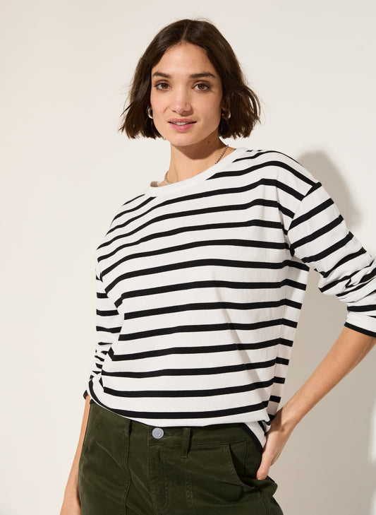 Black and white striped long-sleeved top.