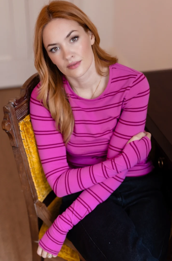 Bright pink and mauve striped long-sleeve top.
