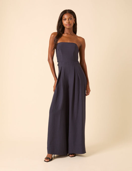 Navy wide leg bandeau jumpsuit with tie back.