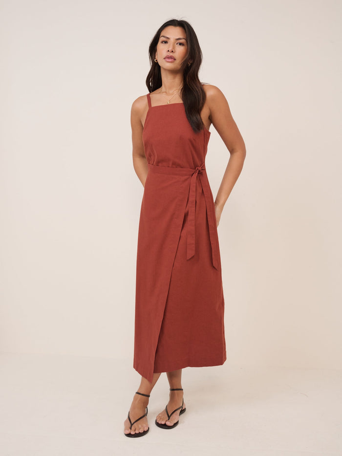 Rust red midi dress with tie waist.