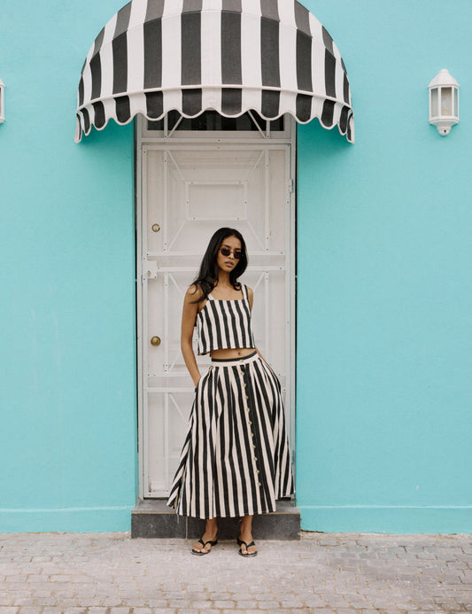 Black and white striped button midi skirt.