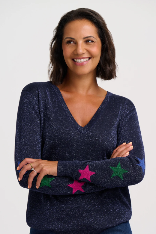 Navy blue sparkly v-neck jumper with star motif along sleeves.