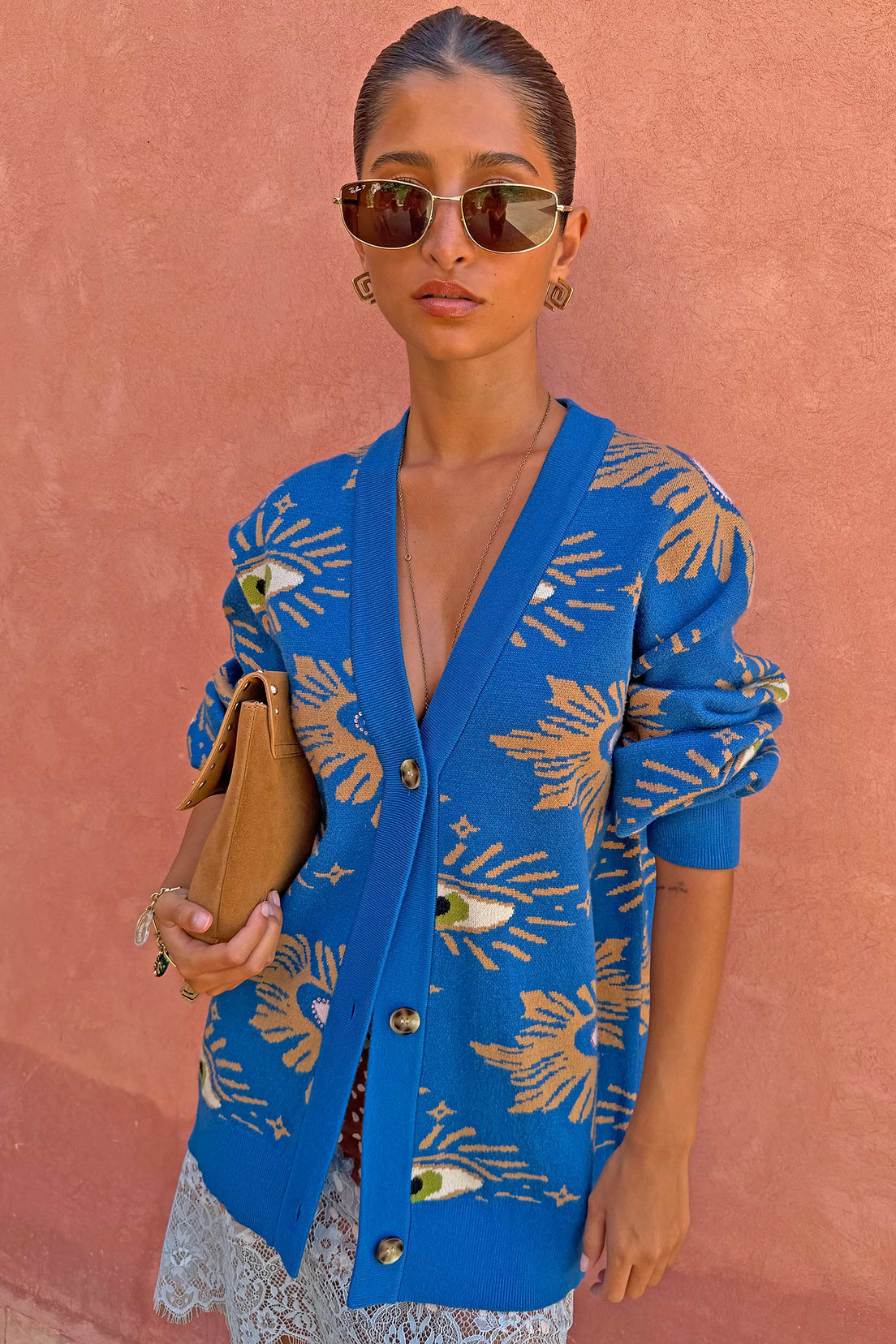 Bright blue and tan abstract print cardigan.