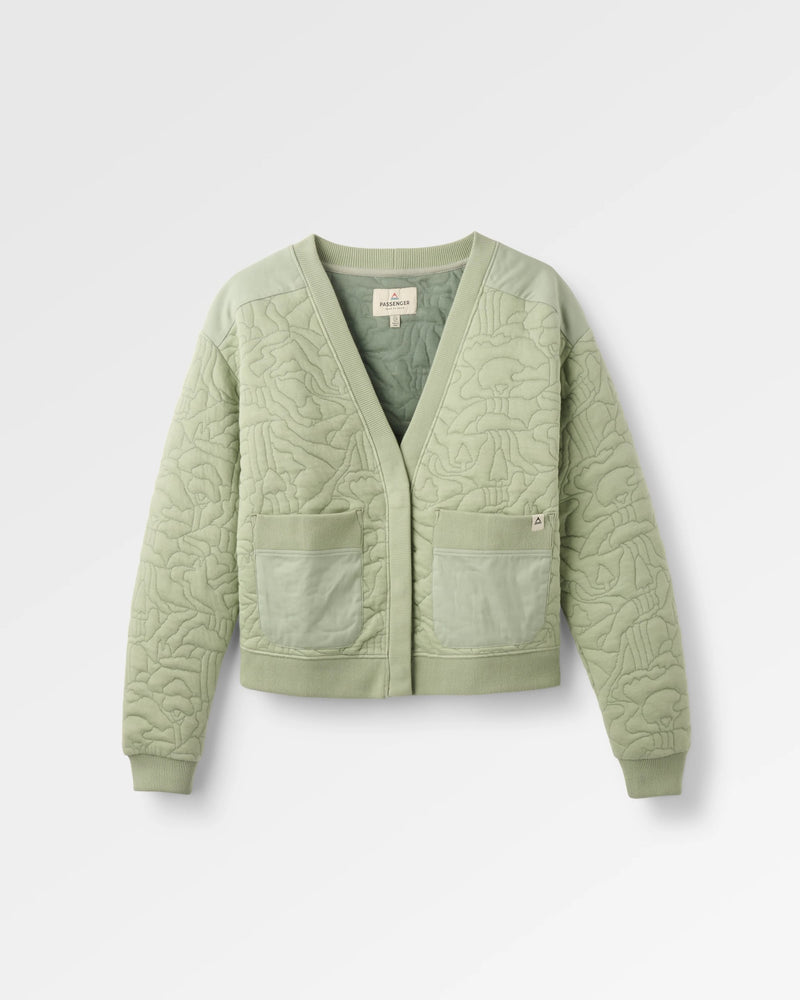 A light sage green quilted cardigan with a V-neck, front pockets, and ribbed cuffs and hem, shown on a light grey background.