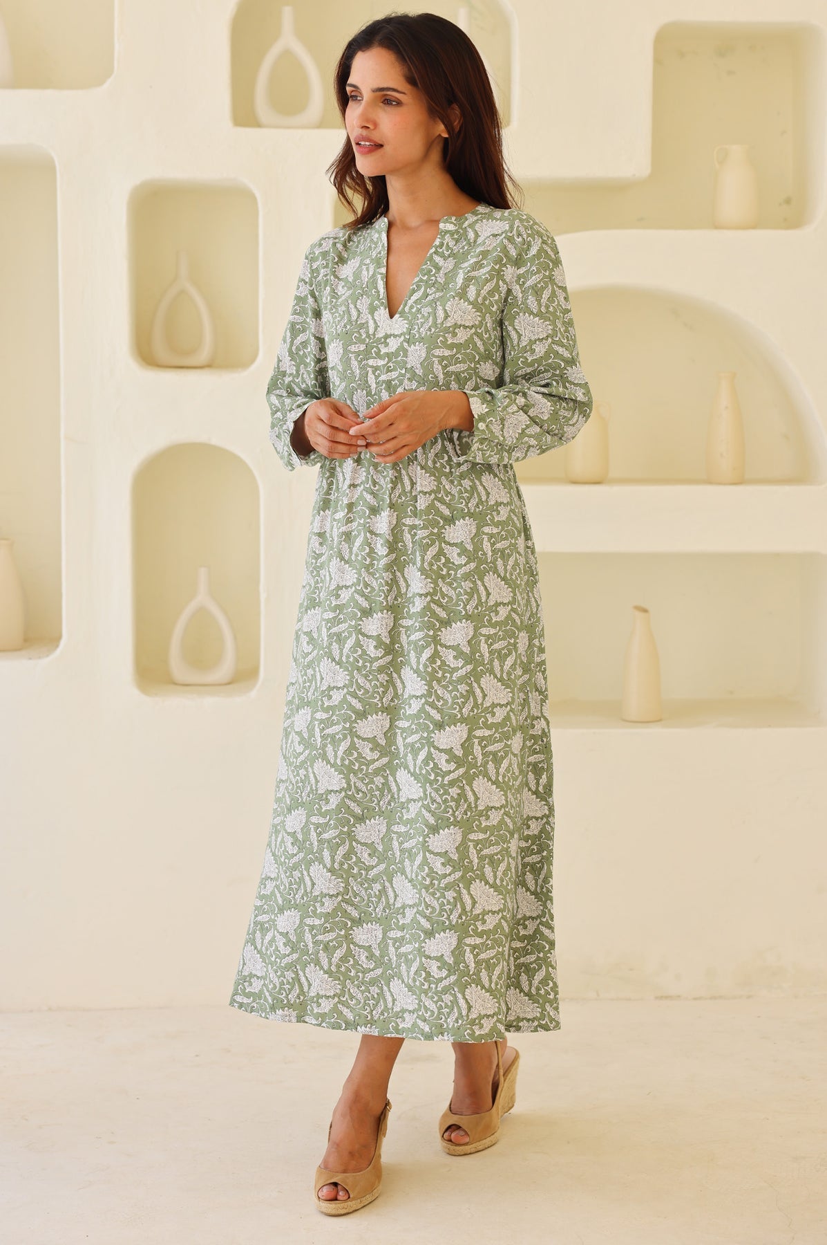 Sage and white floral midi dress.