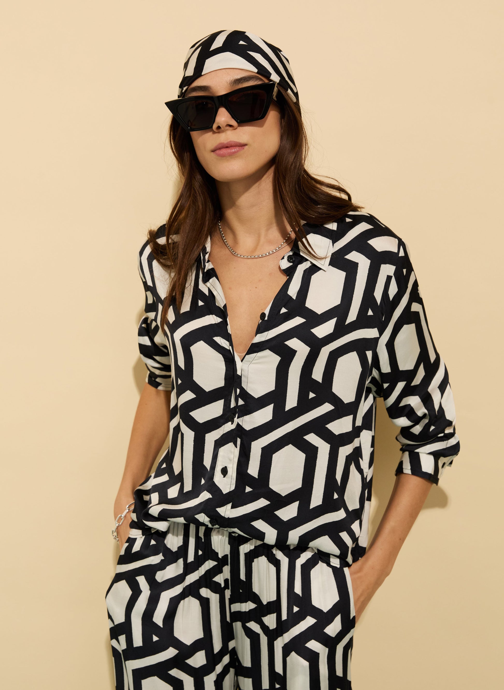 Bold geometric print black and white satin shirt.