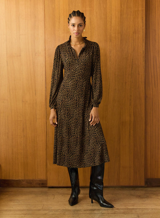 Dark brown leopard print long sleeved midi dress.