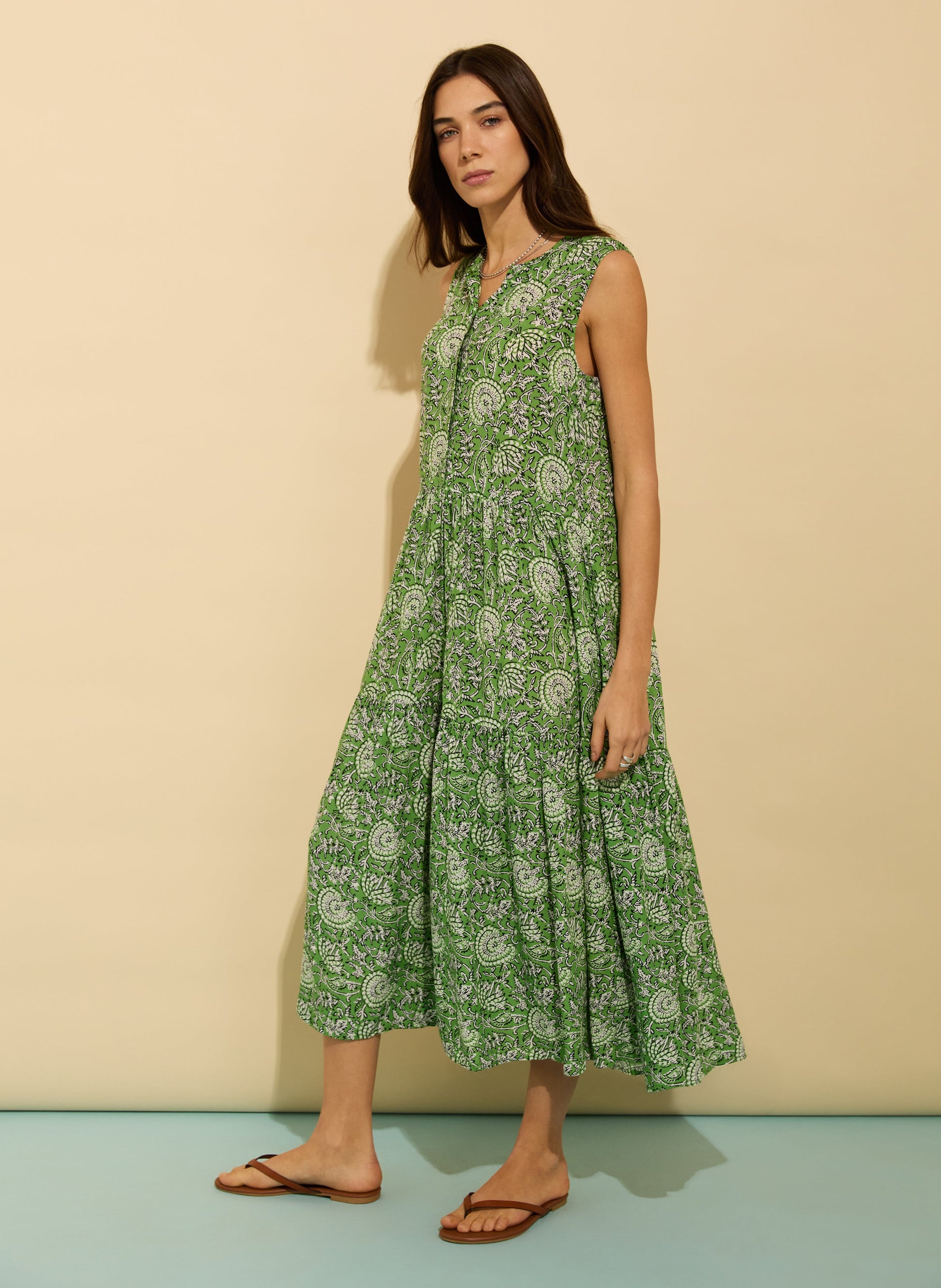 Green geometric print midi dress.