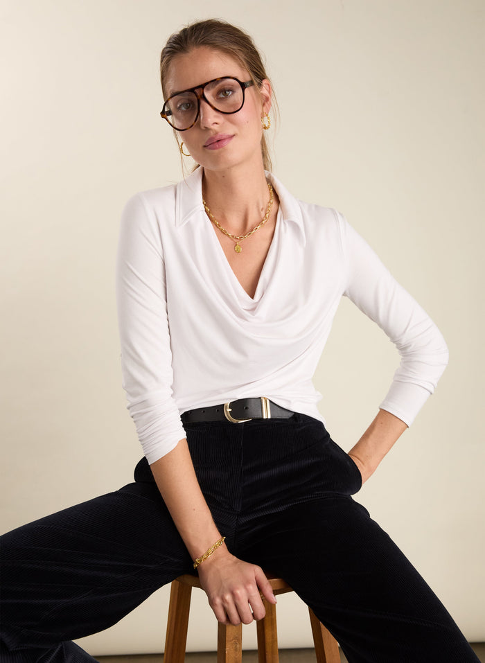 White cowl-neck top with collar.