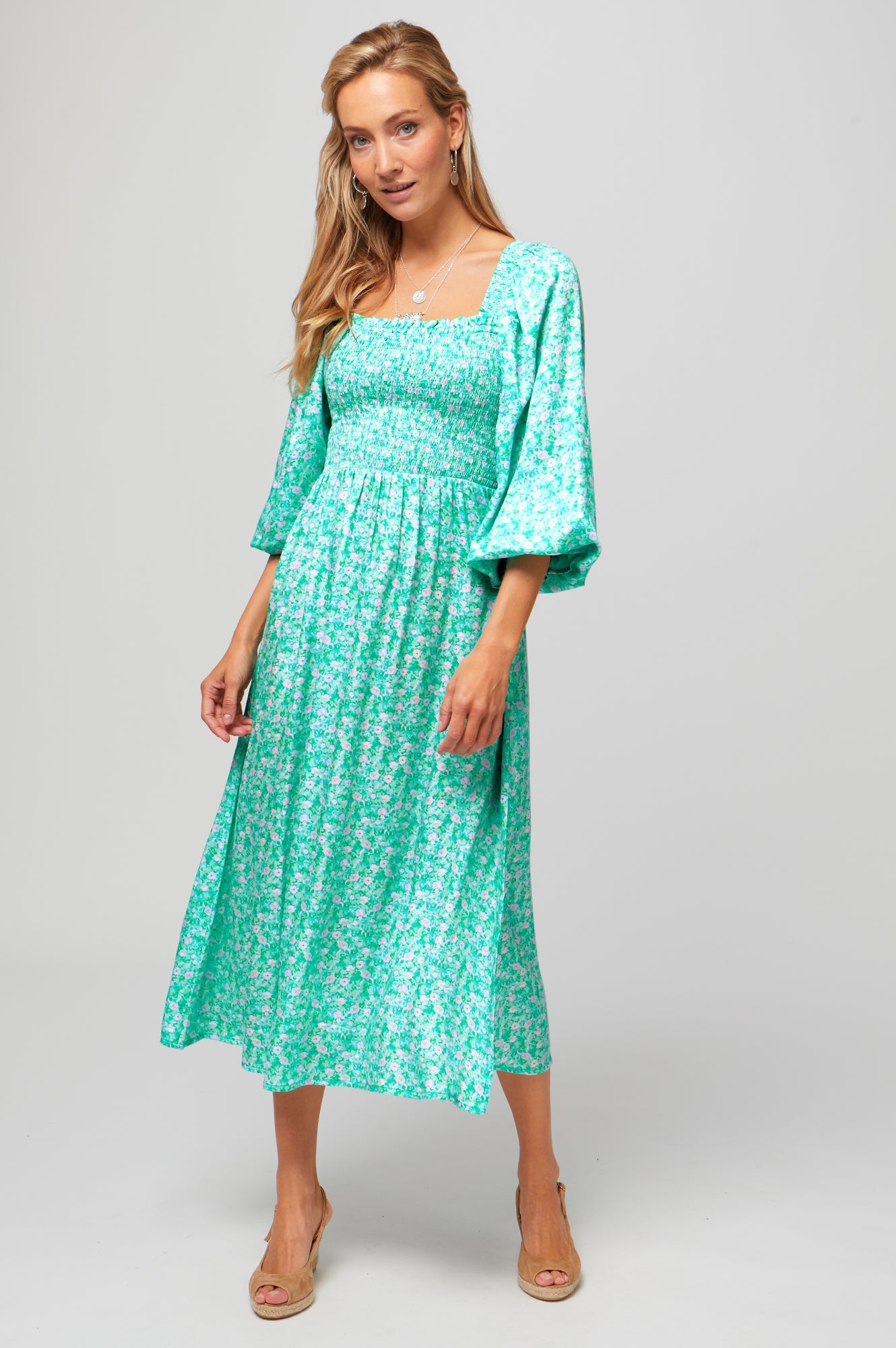 Mint green floral dress with shirred bodice.
