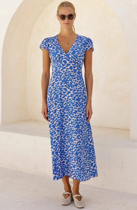 Blue and cream abstract print midi dress with V-neckline, short sleeves, and fitted waist.