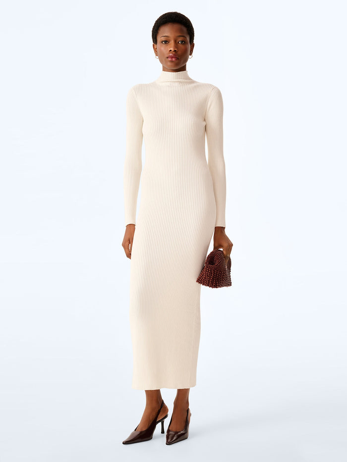 Cream rib knit turtleneck dress.