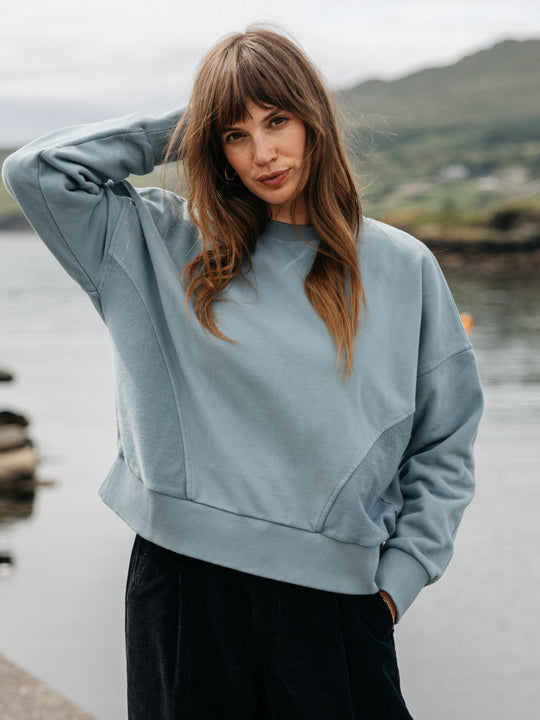 Soft blue organic cotton sweatshirt.