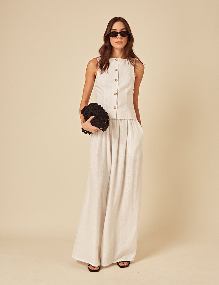 White linen-blend wide leg trousers.