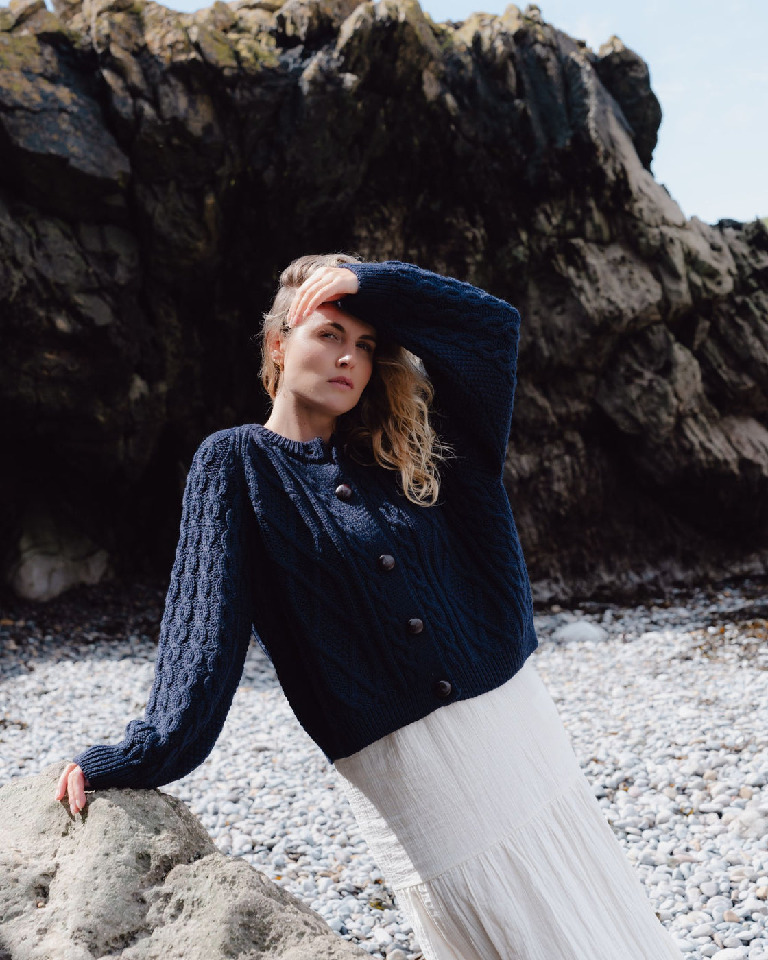 Navy cable knit merino cardigan.