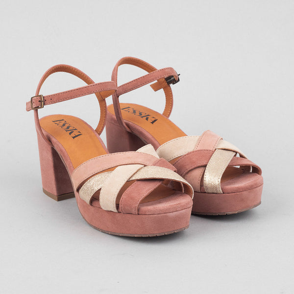 Dusky pink heeled suede sandals.