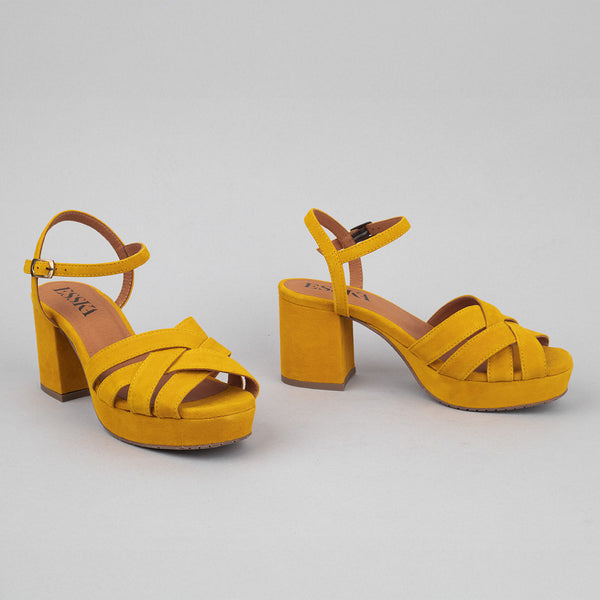 Mustard yellow suede platform sandals.