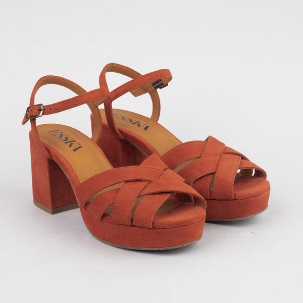 Rust-orange suede platform sandals.