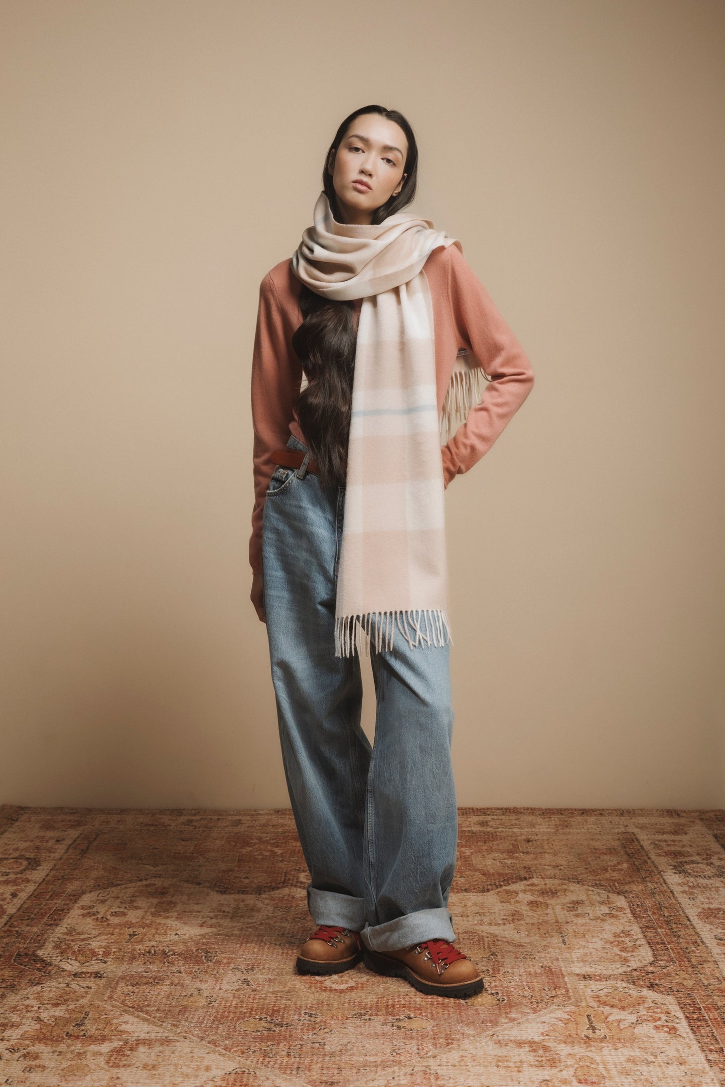 Peach and beige checked cashmere scarf.