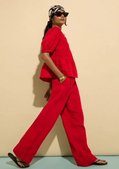 Bright red co-ord outfit.