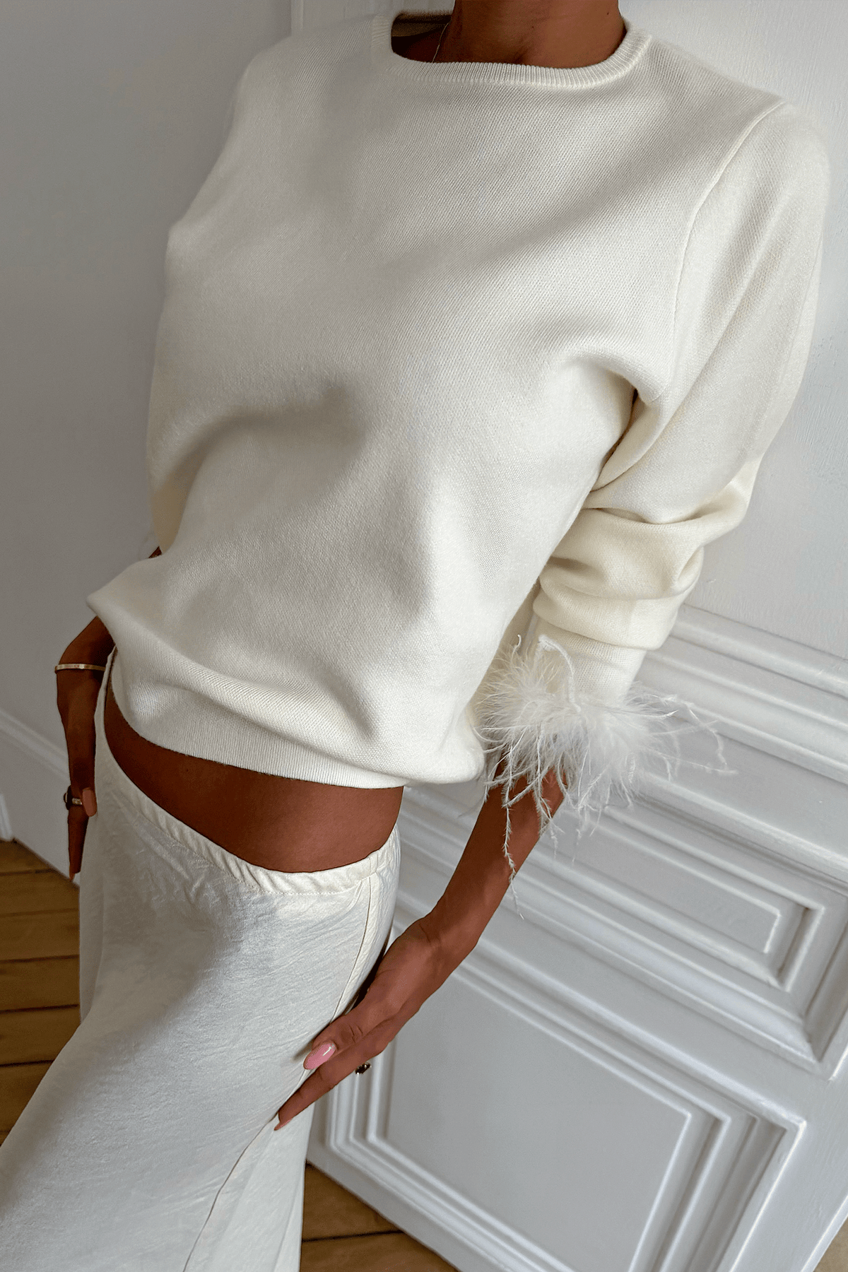 Cream feather trim jumper.