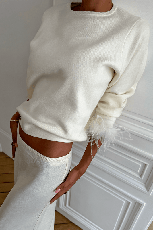 Cream feather trim jumper.