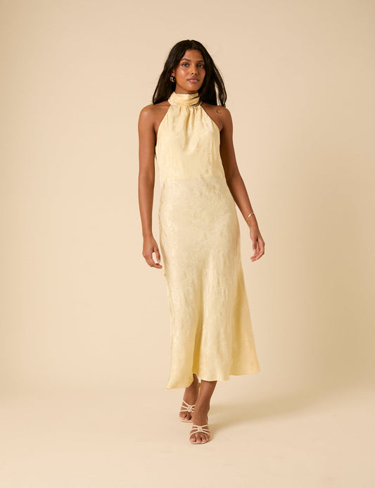 Butter yellow jacquard halterneck dress.