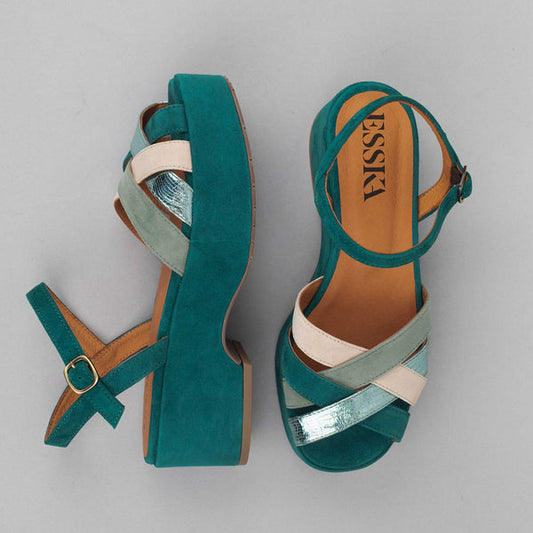 Teal suede platform sandals.