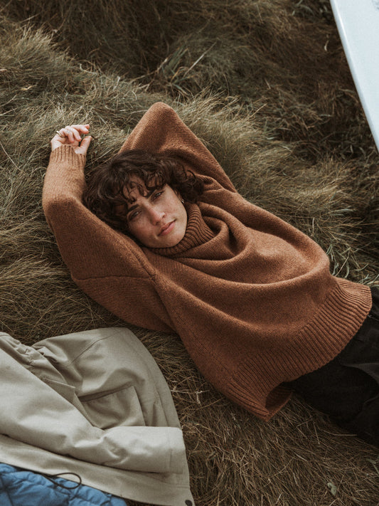 Chestnut brown wool blend roll neck jumper.