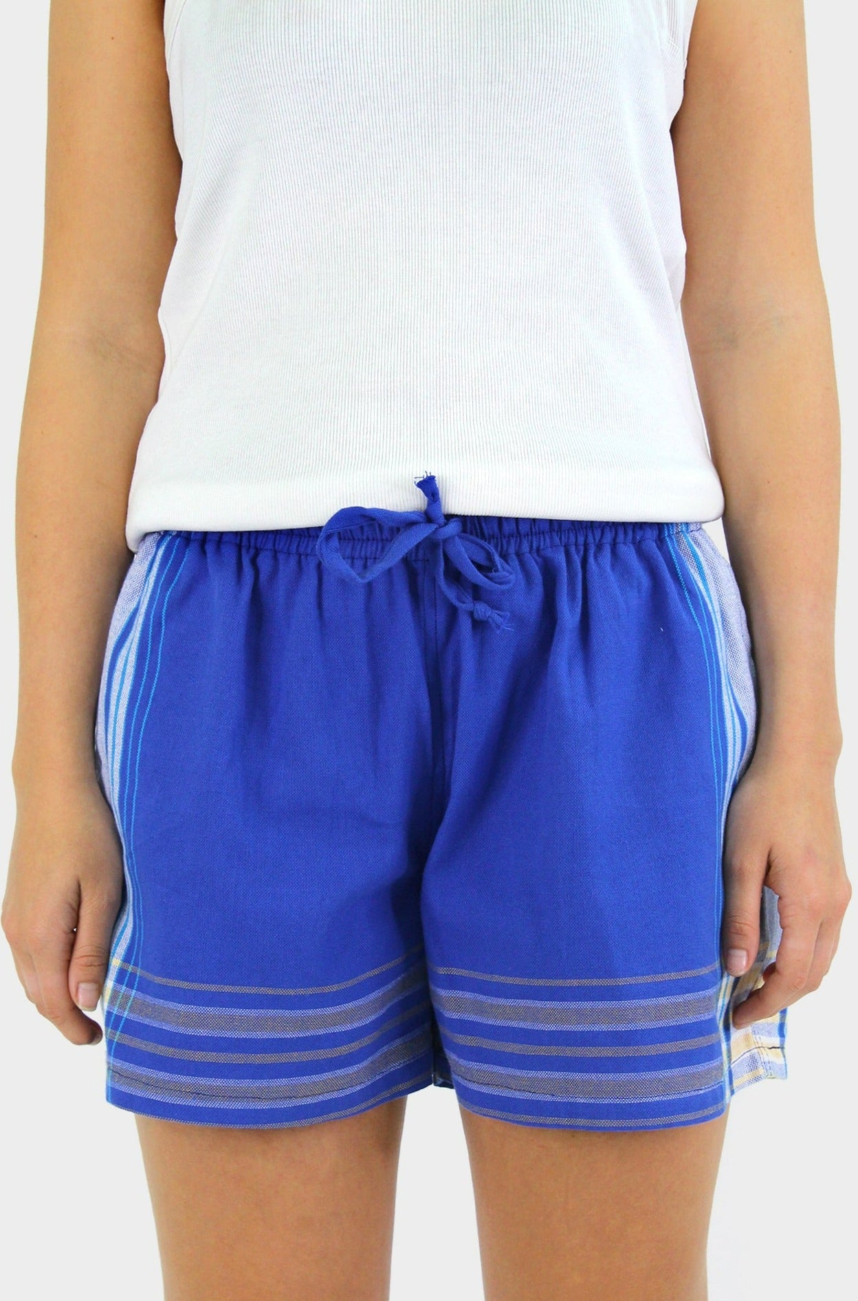 Bright cobalt blue Kikoy fabric shorts with elasticated drawstring waistband and tonal stripe detailing along the sides and hem.