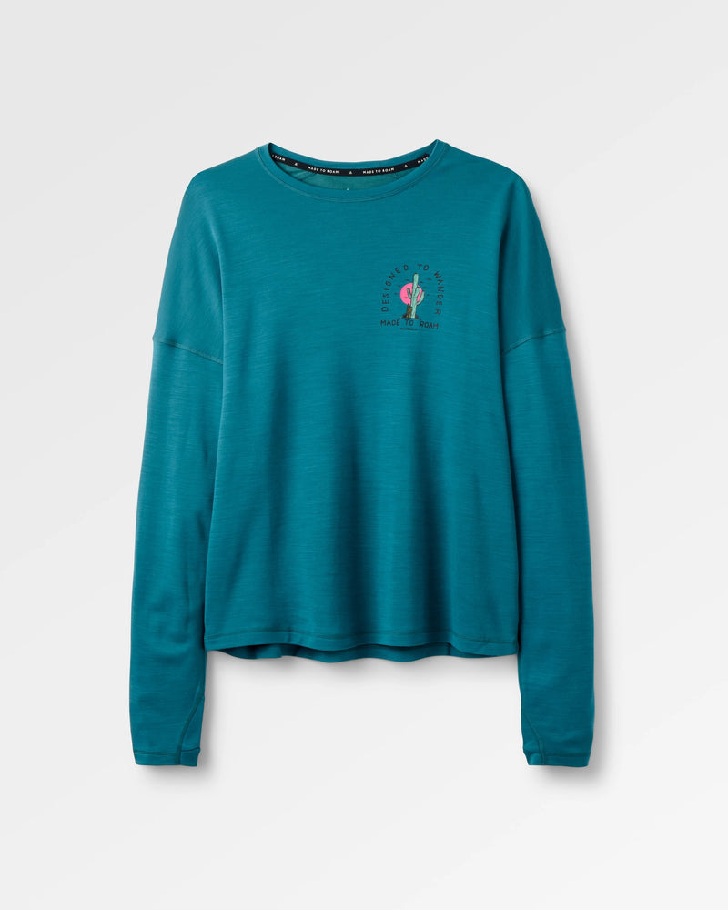 Teal long-sleeved activewear merino top.