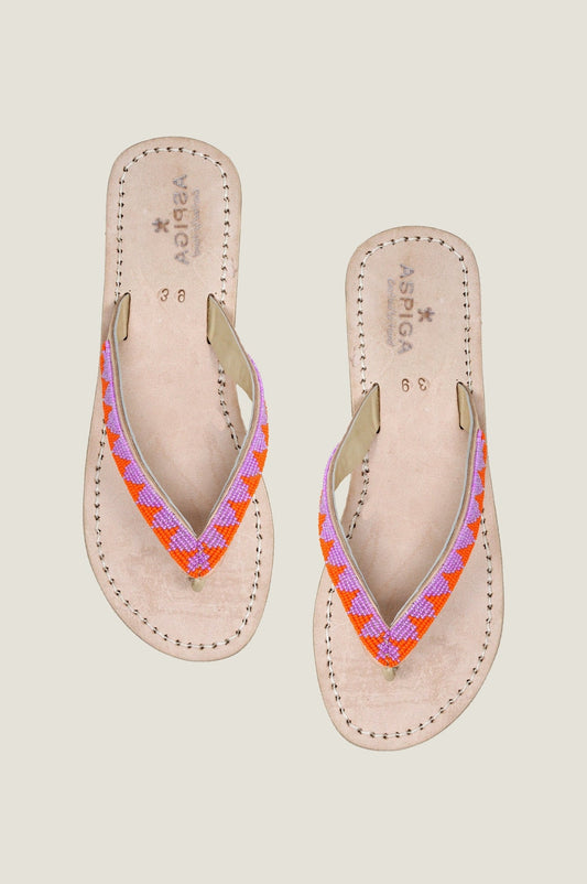 Natural leather flip-flop sandals with pink and orange woven strap detailing.
