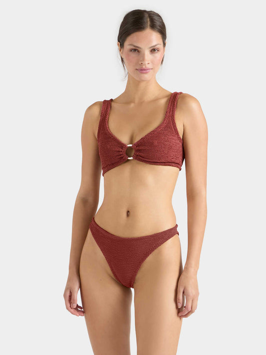Metallic rosewood crinkle fabric bikini with gold hoop.