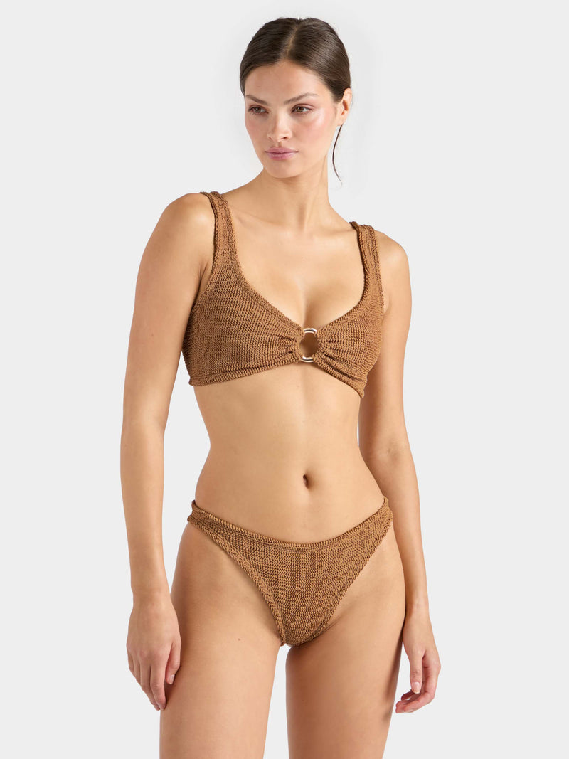 Warm brown crinkle fabric bikini with gold hoop.
