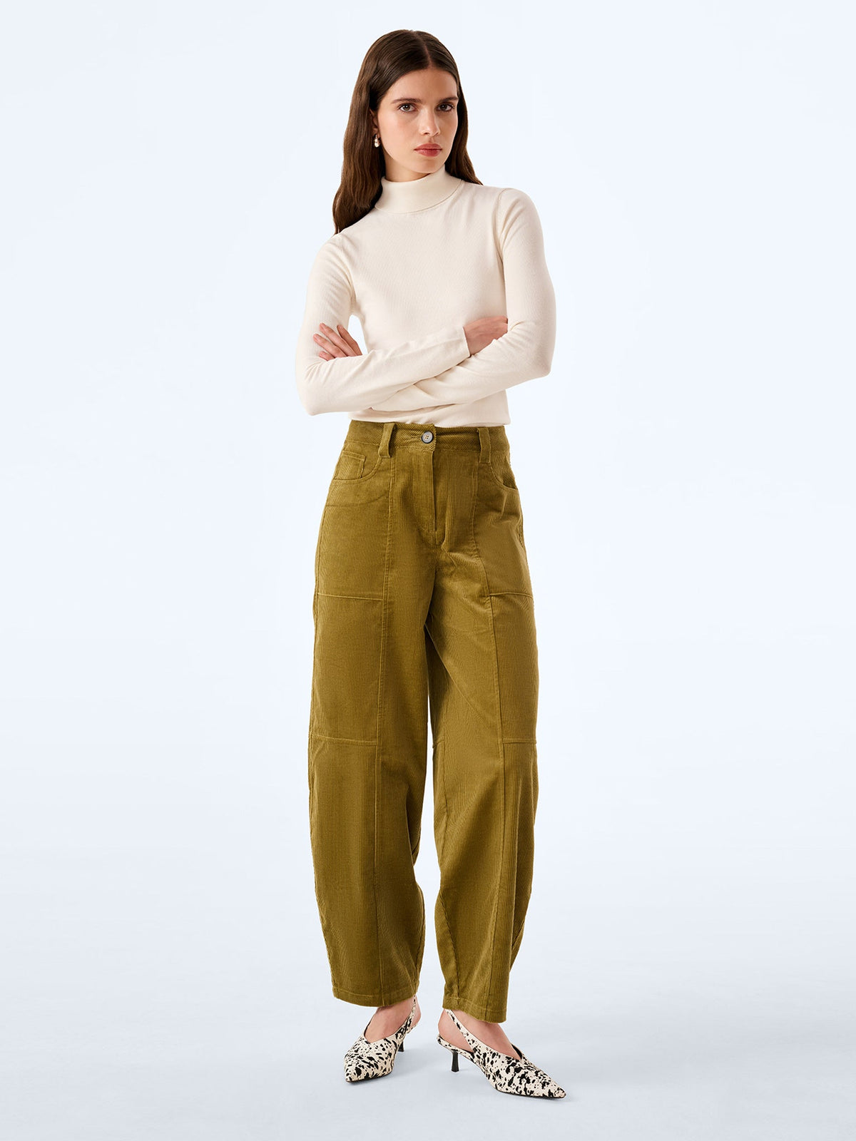 Golden olive corduroy trousers.