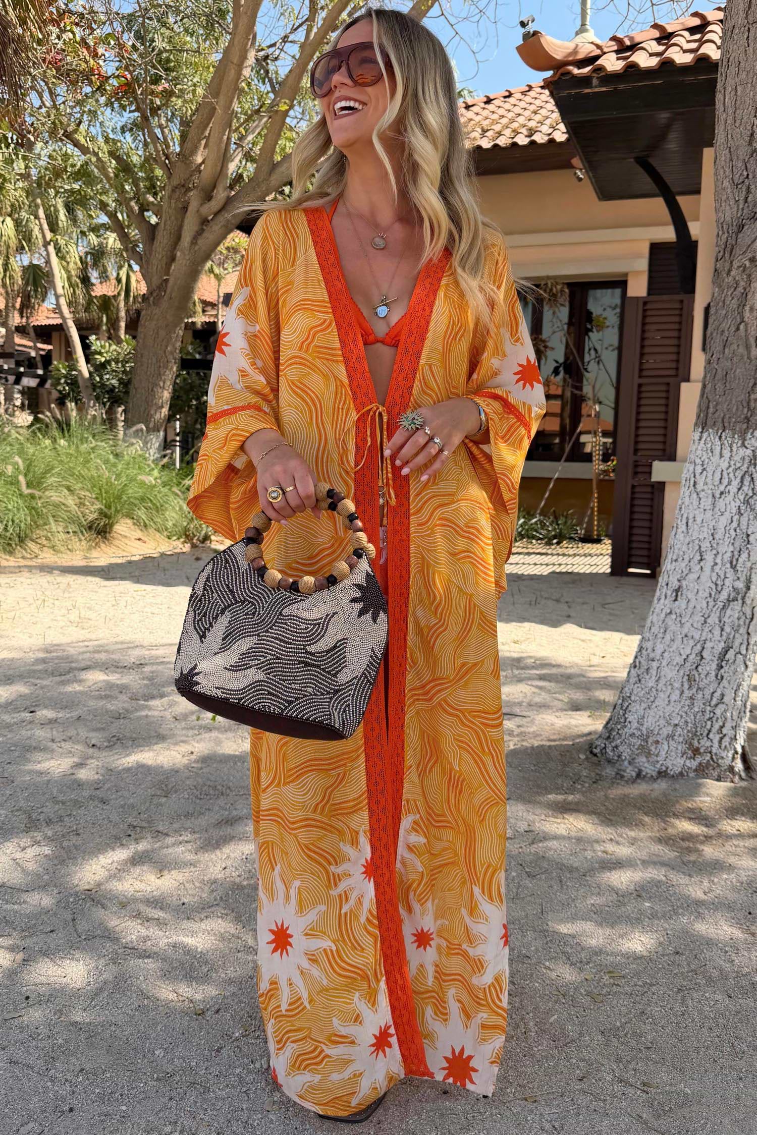 Yellow and orange sun print kimono with beading.