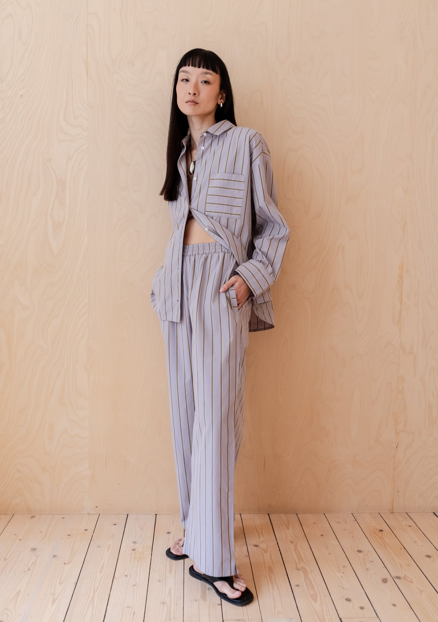 Lilac relaxed fit cotton poplin trousers with olive stripe.